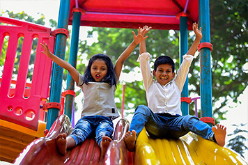 full-shot-smiley-girl-with-down-syndrome_23-2149531917